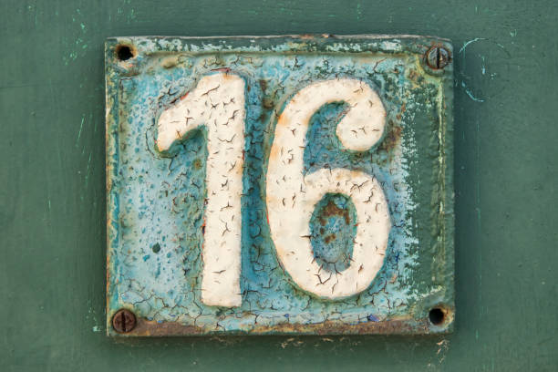 istock Old retro cast iron plate number 16 1441186368