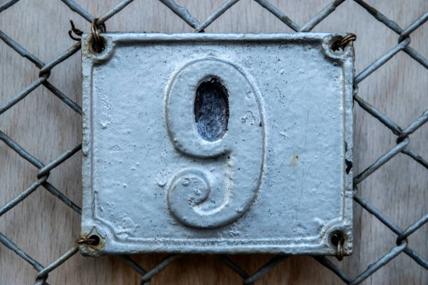 istock Old retro cast iron plate number 9 1441186370