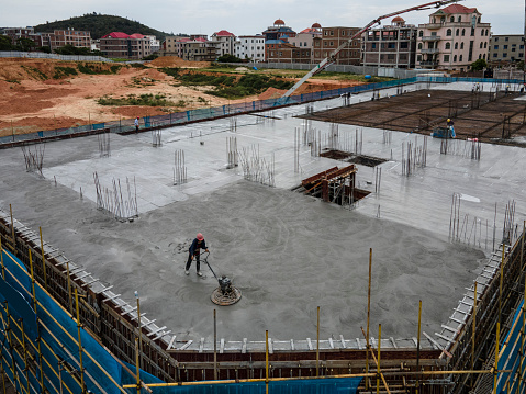 Aerial view of workers working on the construction site