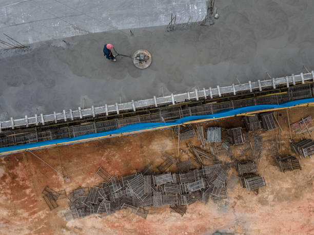 istock Aerial view of workers working on the construction site 1441186503