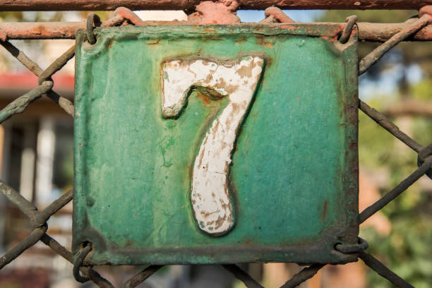 istock Old retro cast iron plate number 7 1441186824