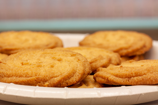 A closeup shot of delicious cookies on a white plate