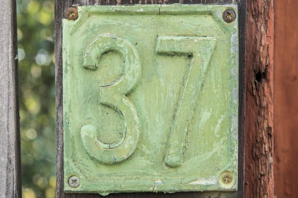 istock Old retro cast iron plate number 37 1441187482