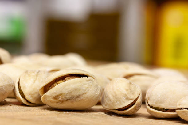 istock Closeup of roasted pistachio nuts with copy space 1441187859