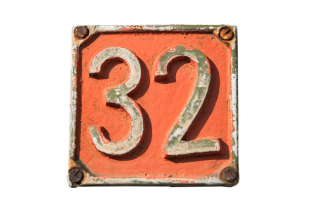 istock Old retro cast iron plate number 32 1441187928