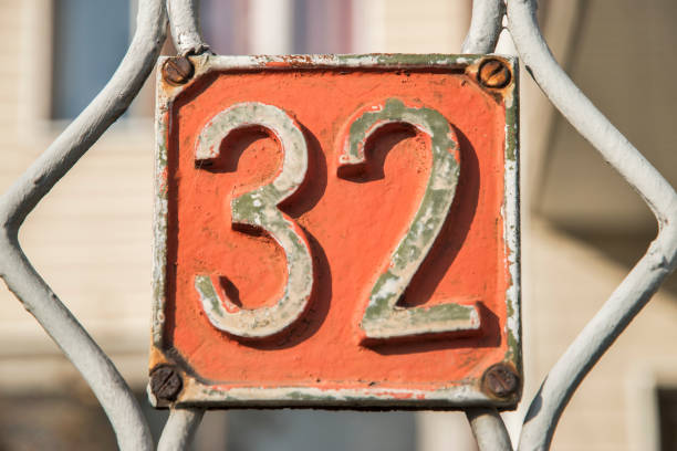 istock Old retro cast iron plate number 32 1441187943