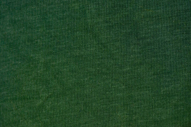 A closeup of green fabric texture