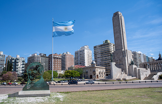 Rosario, Argentina – October 06, 2020: General plan of the park ok flag with the sculpture of Manuel Belgrano the Argentine flag waving and the National Monument memorial