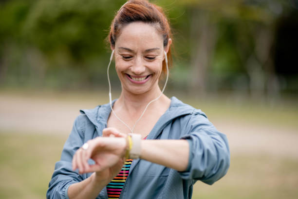 istock Woman seeing her smart watch during exercises 1441191862