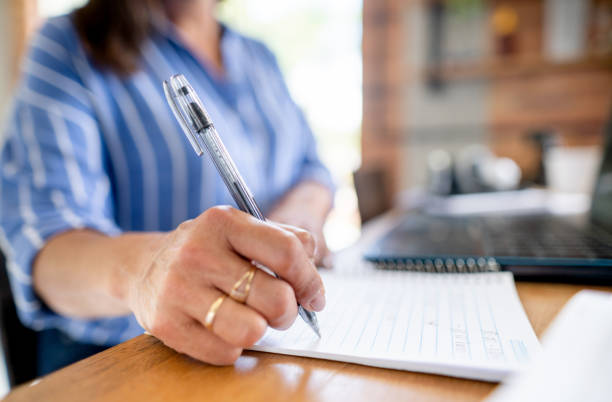istock Woman studying and workin in her home office 1441192248