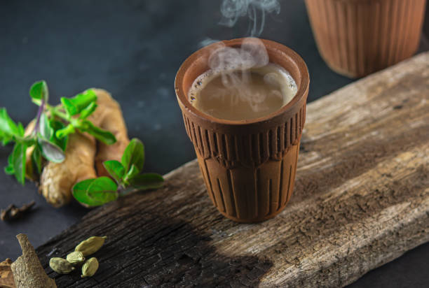 istock Hot Tandoori Tea (Indian milk tea) with its ingredients 1441193321