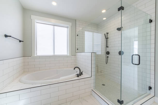istock Modern interior of a bathroom with a big bathtub and cabin 1441193648