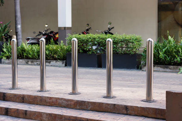 istock steel bollards in row on footpath. 1441194285