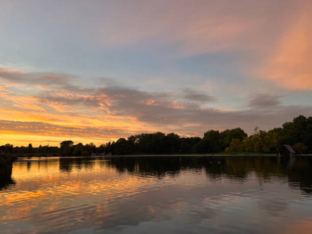 istock Sunset at the lake with beautiful orange sky 1441194561
