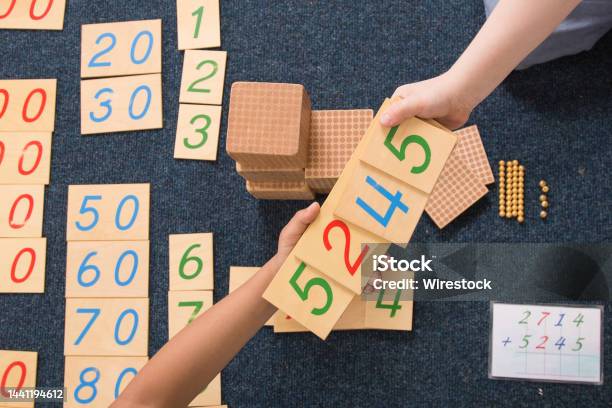 Montessori Learning With Numbers On Wooden Blocks Stock Photo - Download Image Now - Montessori Education, Classroom, Block Shape