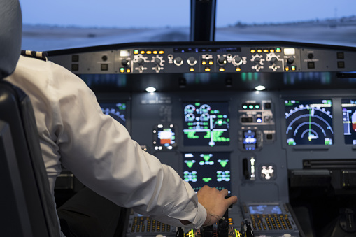 the commercial flight simulator starting takeoff while the pilot operates the acceleration lever