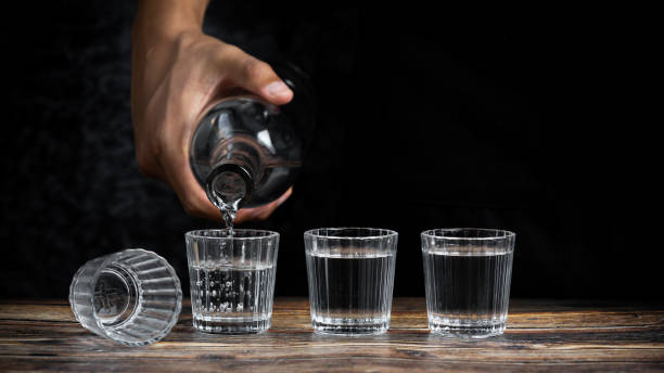 istock Barman pouring tequila into four shots 1441196769