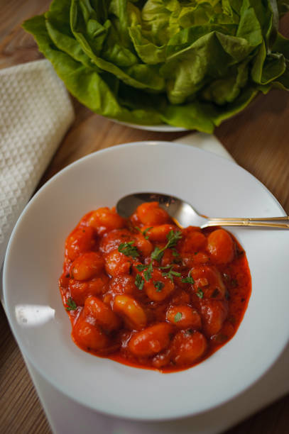 istock Vertical shot of beans in tomato sauce 1441196945