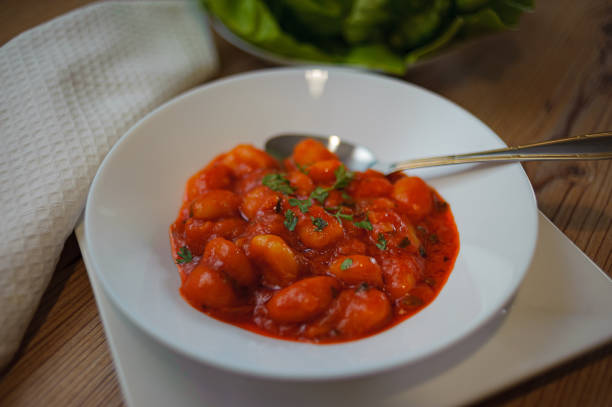 istock Bowl with beans in tomato sauce 1441196980