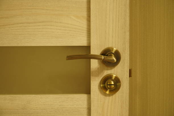 istock Exterior door handle and Security lock on Metal frame. Door handle with lock in the door 1441199257