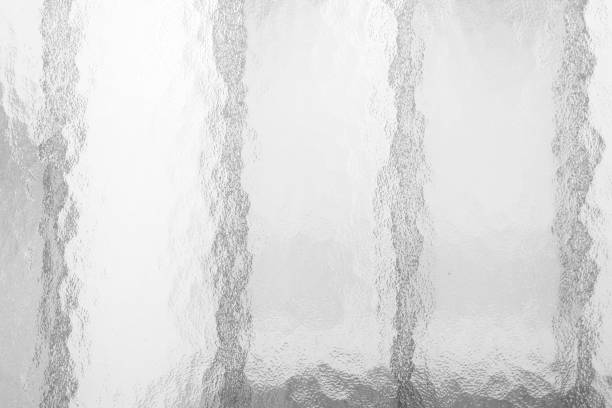 istock White Glass Window Background with Wrought Iron Shadow. 1441208549
