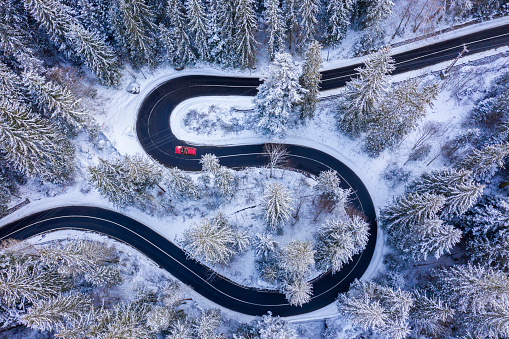 Curvy mountain road viewed from above. Bicaz Gorges is a narrow pass in Romanian Carpathians between Moldavia and Transylvania
