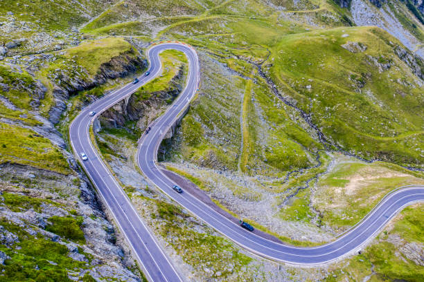 istock Beautiful mountain road during summer 1441209451