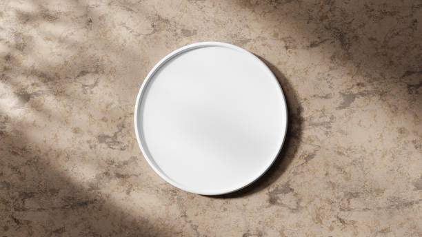 istock White plate kitchen mockup on beige neutral background 3d with modern lighting 1441209777