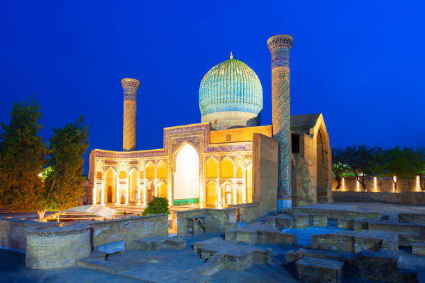 Guri Amir or Gur Emir mausoleum, Samarkand Guri Amir or Gur Emir is a mausoleum of the Mongol conqueror Amir Temur or Tamerlane in Samarkand, Uzbekistan at night samarkand stock pictures, royalty-free photos & images