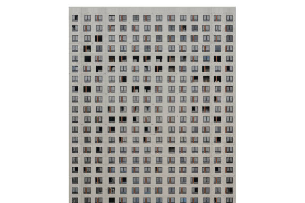 Facade with windows of an unfinished building, closeup house