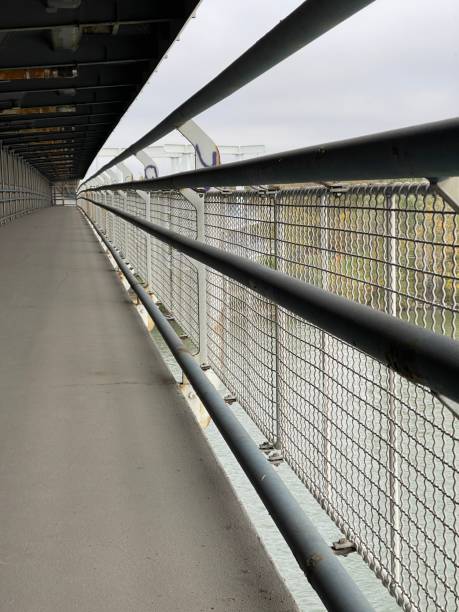 istock Industrial bridge over the river 1441215801