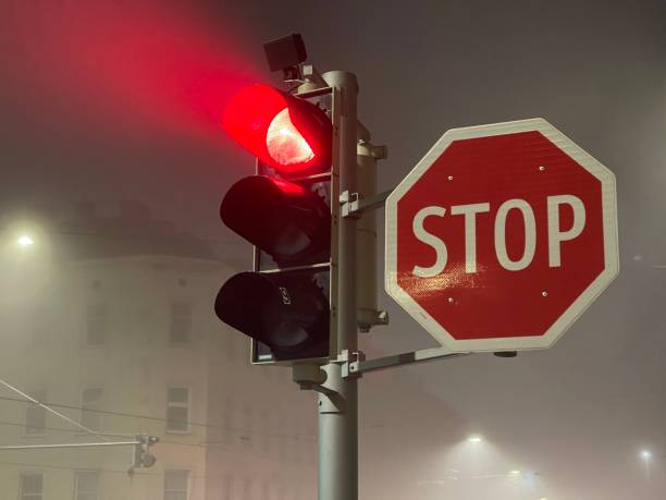 istock Traffic lights in the fog 1441216366