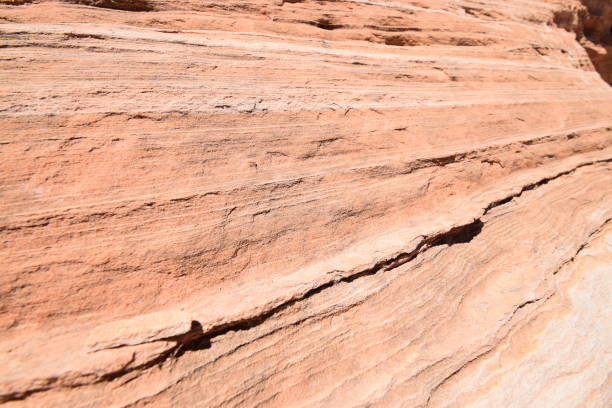 istock Close-up of red sandstone formation, pattern shaped by erosion 1441217940