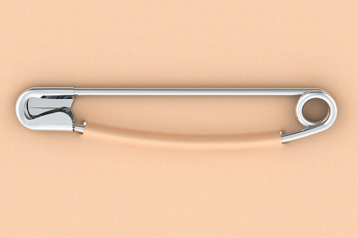 Metal safety pin on clothing. 3D rendering