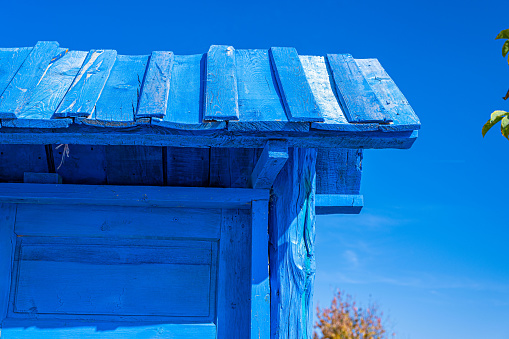 Old wooden door in blue color.