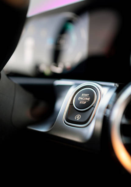 Start stop engine button on a modern car dashboard stock photo