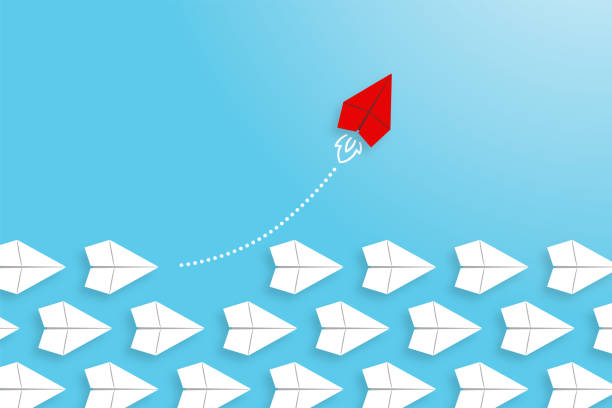 istock Innovation concepts with red paper airplane leading among white on blue background 1441224998