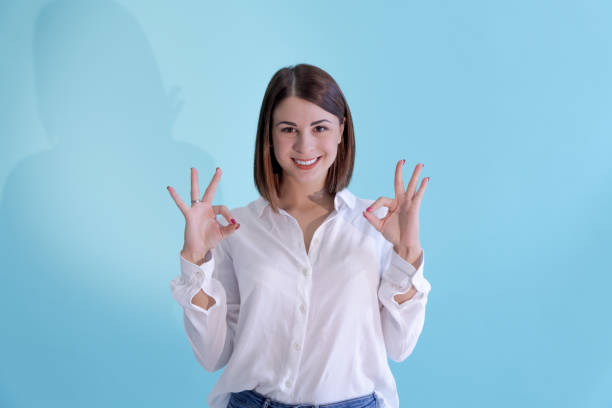 istock Woman shows OK sign 1441228166