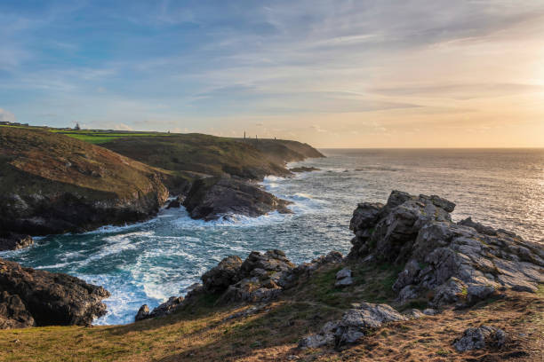 istock Stunning sunset landscape image of Cornwall cliff coastline with tin mines in background viewed from Pendeen Lighthouse headland 1441230947