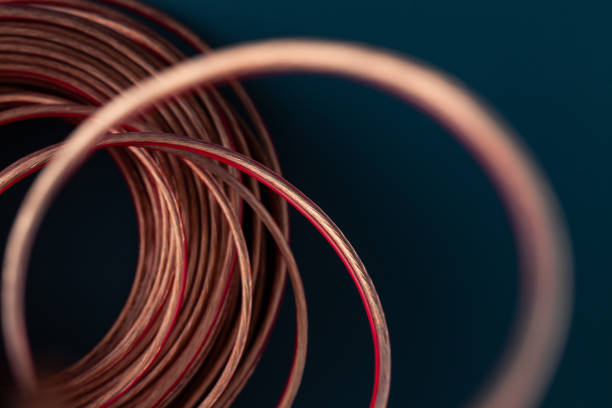 Shiny roll of copper wire stock photo