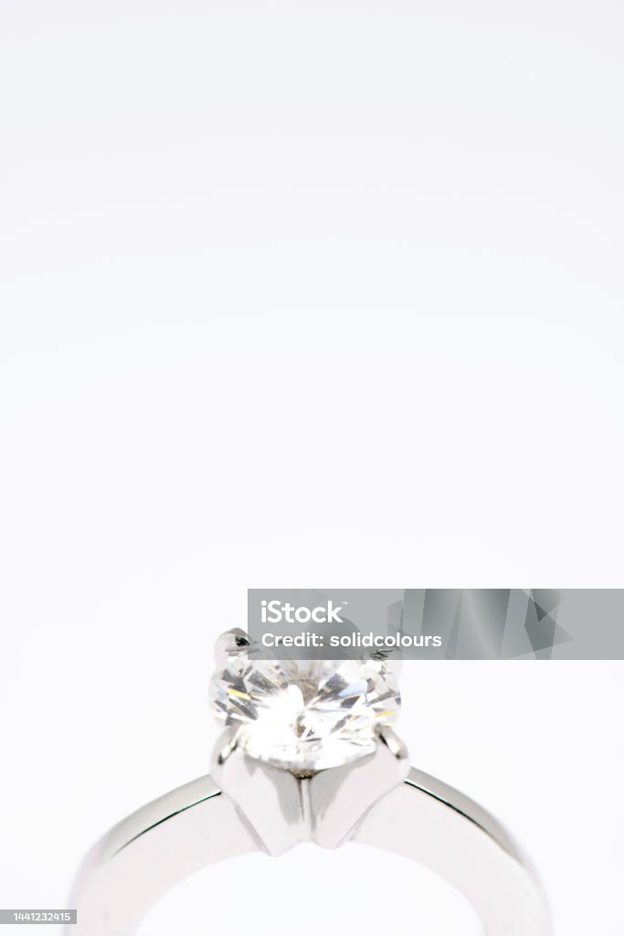 Diamond Ring Close up of a diamond ring on white background. Diamond - Gemstone Stock Photo