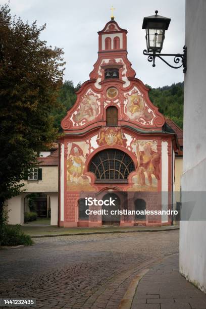 View Of The Traditional Painted Bavarian Church Of The Holy Spirit In The Village Of Fussen Stock Photo - Download Image Now