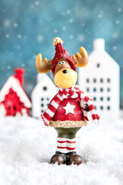 Elegant classic christmas card for holidays. Christmas decorative toy with houses on background