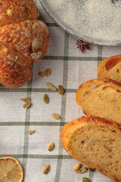 istock Slices of craft pumpkin bread 1441234583