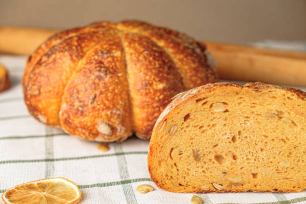istock Slices of craft pumpkin bread 1441234601
