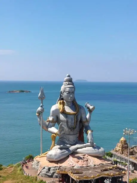 statue of  Lord Shiva in Murudeshwara with a sea background