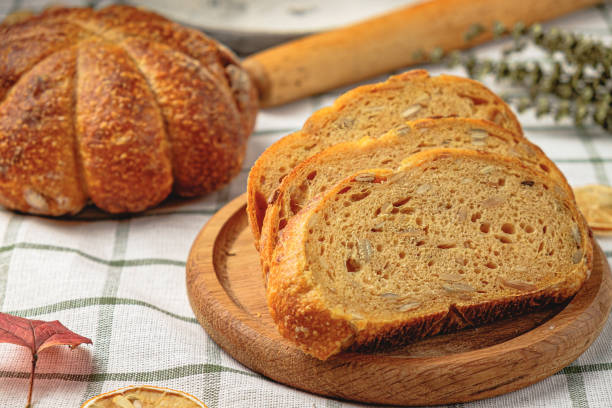 istock Slices of craft pumpkin bread 1441234622