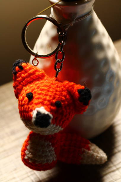 istock White Vase with Crochet Fox Ornament 1441236217