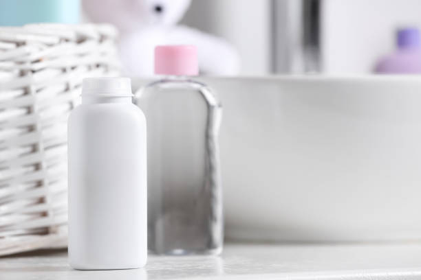 istock Baby cosmetic products on white table, space for text 1441236232