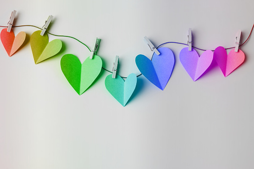 Paper hearts on a clothesline with space for copy